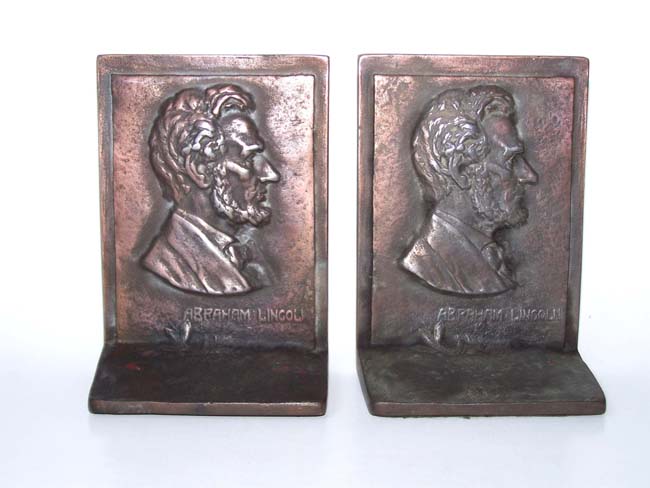 A pair of Antique cast iron Bookends circa 1925 having the bust of Abraham Lincoln